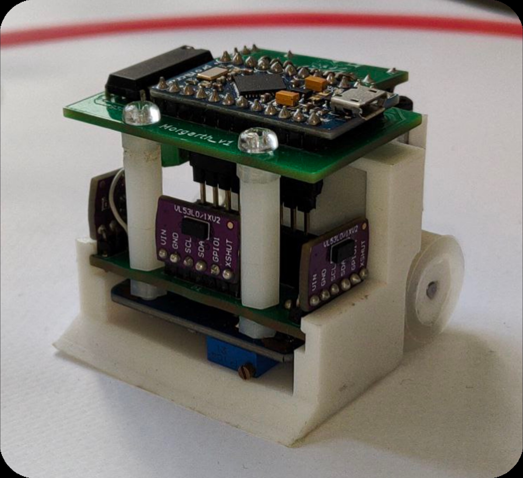Версия 2 — чистый белый корпус с VL53L0X лазерными датчиками и платой управления